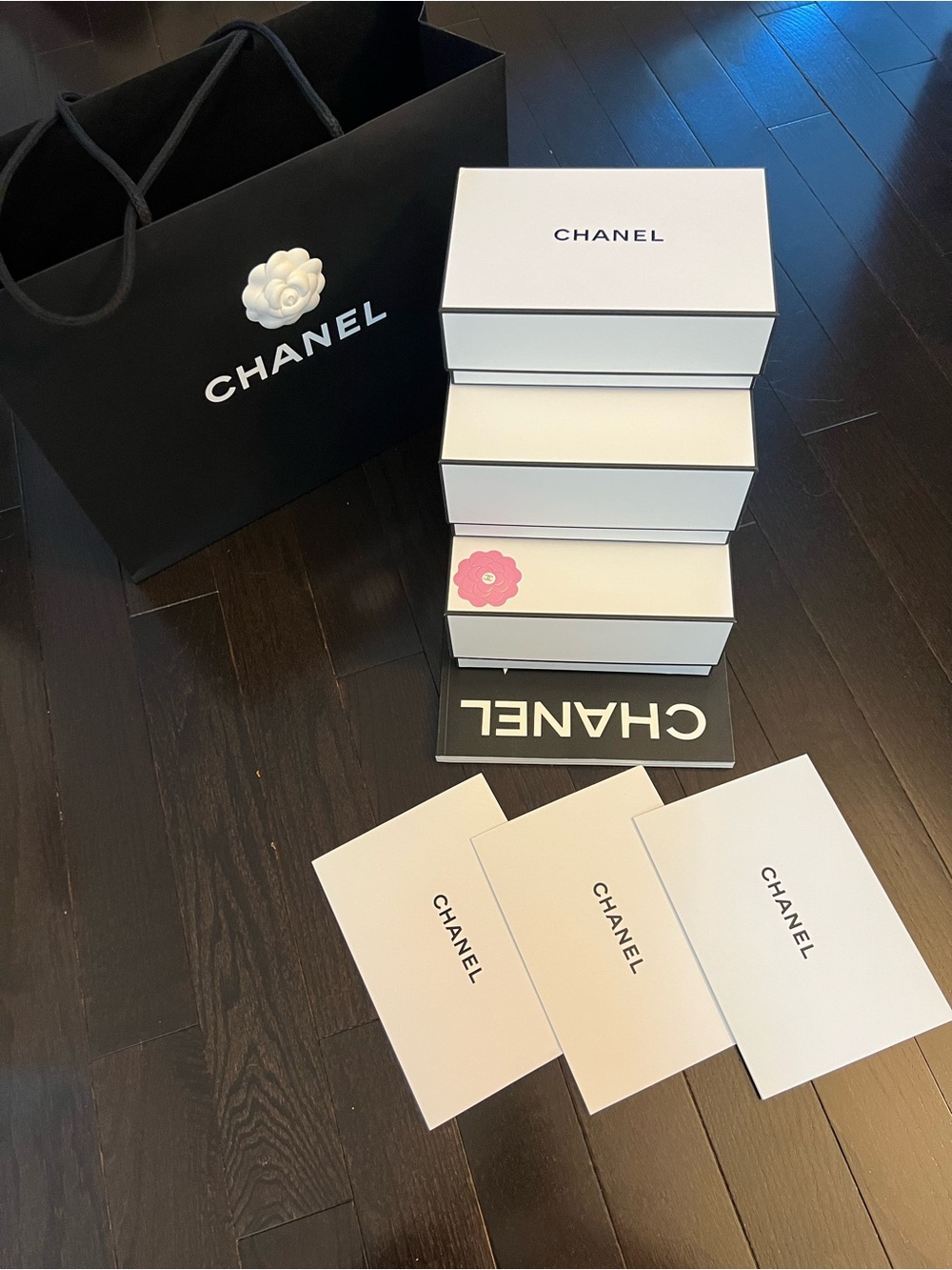 CHANEL 5-piece set of assorted gift boxes, Coffee-table Catalog and Gift Bag